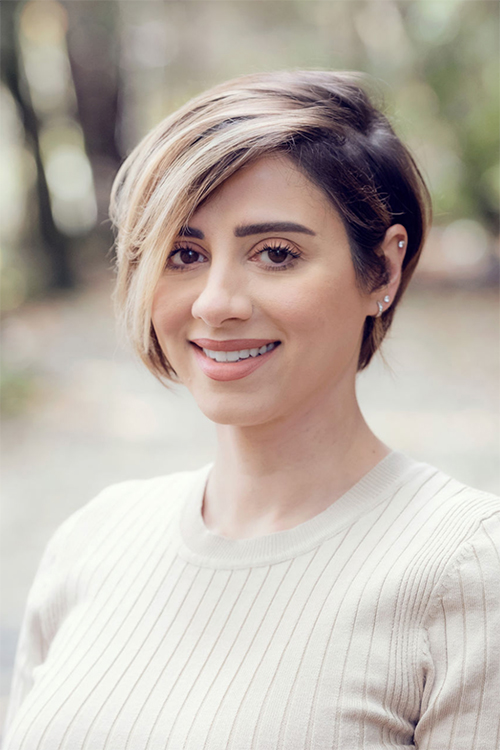 young woman short hair smiling