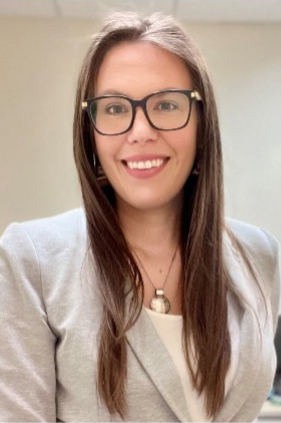 young woman glasses smiling long hair