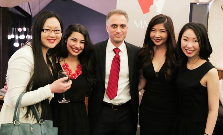 The Beedie School of Business 2015 MMICC team. From left to right: Kelly Yang, Carmela Luongo, team coach Kamal Masri, Julia Luu, and Natalie Lau.