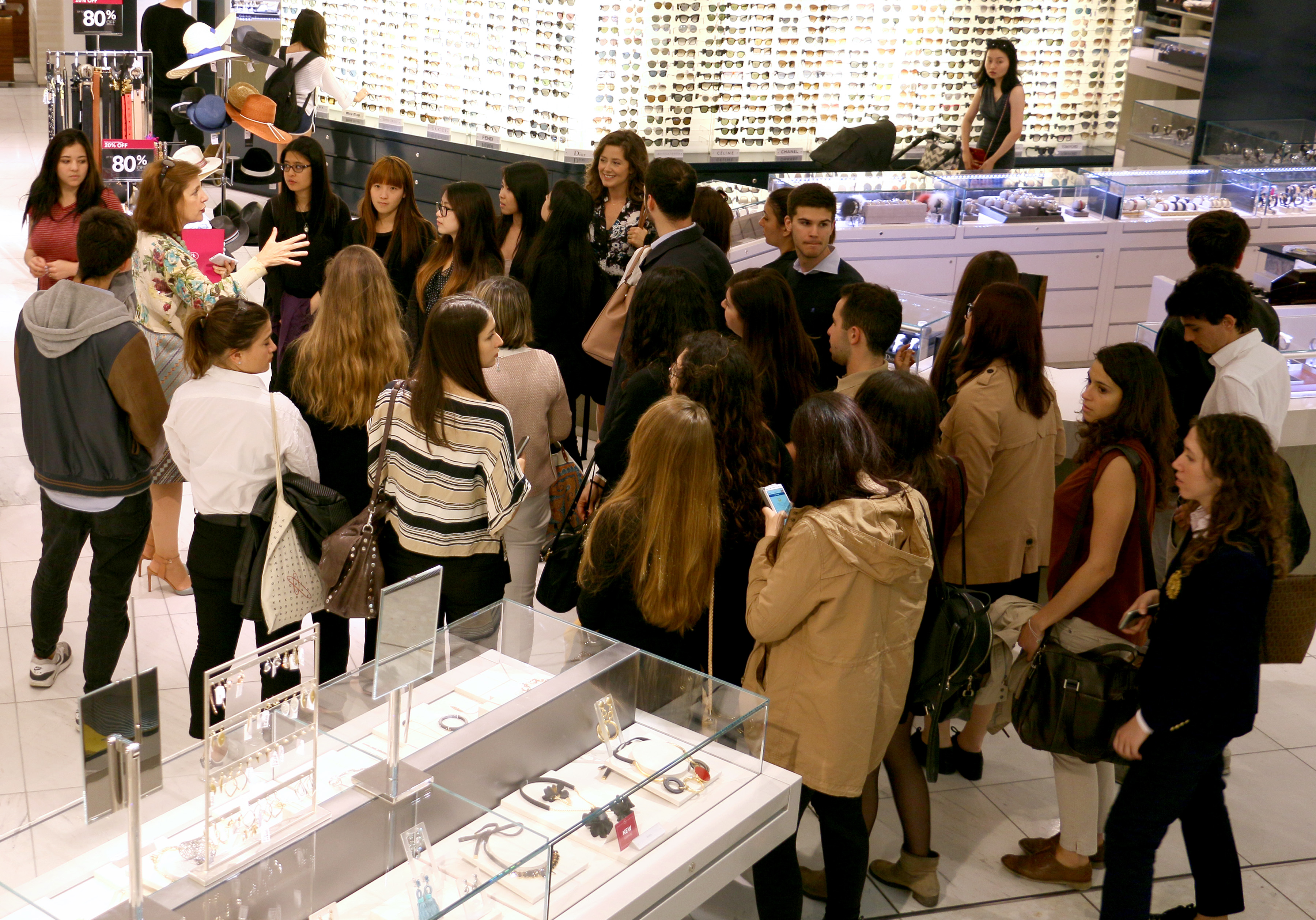 Bocconi and Beedie students tour Holt Renfrew.